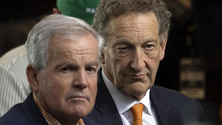 Oct 30, 2025; San Francisco, CA, USA;  San Francisco Giants owner Greg Johnson (left) and chief executive officer Larry Baer (right) watch as Tony Vitello (not pictured) is introduced as the new manager at Oracle Park. Mandatory Credit: D. Ross Cameron-Imagn Images