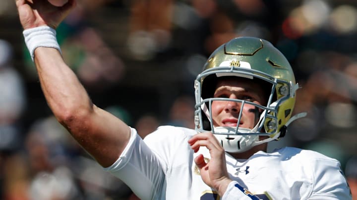Notre Dame Fighting Irish quarterback Riley Leonard (13) warms up Saturday, Sept. 14, 2024, ahead of the NCAA football game against the Purdue Boilermakers at Ross-Ade Stadium in West Lafayette, Ind. Notre Dame Fighting Irish quarterback Riley Leonard (13) warms up Saturday, Sept. 14, 2024, ahead of the NCAA football game against the Purdue Boilermakers at Ross-Ade Stadium in West Lafayette, Ind.