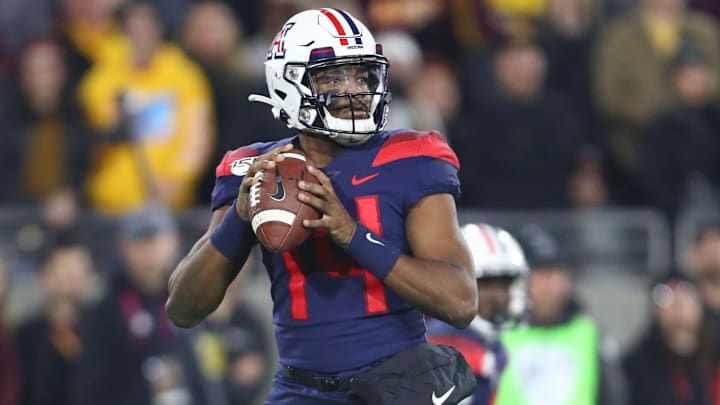 Nov 30, 2019; Tempe, AZ, USA; Arizona Wildcats quarterback Khalil Tate (14) against the Arizona State Sun Devils during the Territorial Cup at Sun Devil Stadium. Mandatory Credit: Mark J. Rebilas-Imagn Images