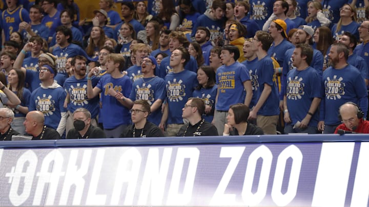 Feb 17, 2024; Pittsburgh, Pennsylvania, USA;  The Pittsburgh Panthers student section cheers against the Louisville Cardinals during the first half at the Petersen Events Center. Mandatory Credit: Charles LeClaire-Imagn Images