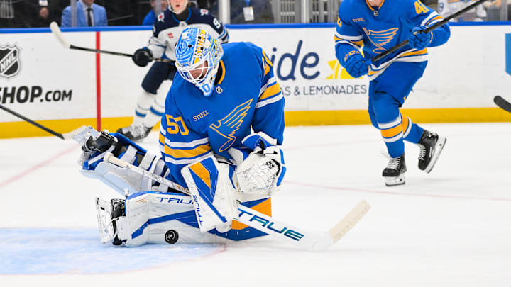 Apr 9, 2026; St. Louis, Missouri, USA; St. Louis Blues goaltender Jordan Binnington (50) defends the net against the Winnipeg Jets during the first period at Enterprise Center. Mandatory Credit: Jeff Curry-Imagn Images