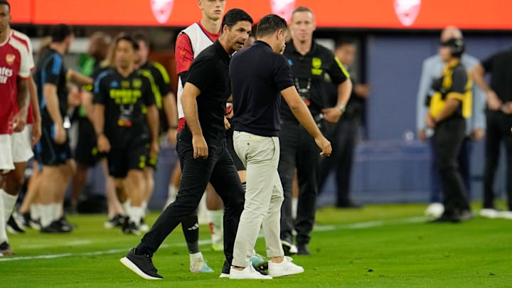 Arteta and Xavi arguing