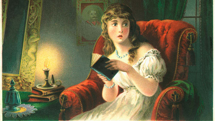 Perhaps she’s reading the screenplay for ‘The Murder in the Red Barn.’ 