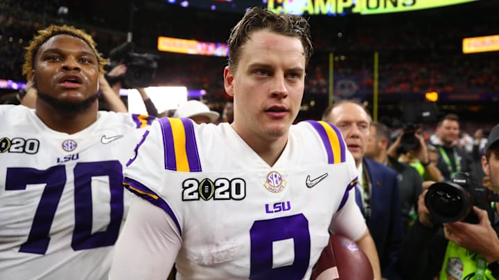 Jan 13, 2020; New Orleans, Louisiana, USA; LSU Tigers quarterback Joe Burrow (9) celebrates after defeating the Clemson Tigers in the College Football Playoff national championship game at Mercedes-Benz Superdome. Mandatory Credit: Mark J. Rebilas-Imagn Images