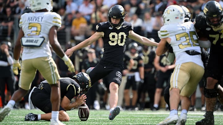 Sep 27, 2025; Winston-Salem, North Carolina, USA;  Wake Forest Demon Deacons kicker Connor Calvert (90) kicks a field goal during the fourth quarter against the Georgia Tech Yellow Jackets at Allegacy Federal Credit Union Stadium. Mandatory Credit: Zachary Taft-Imagn Images