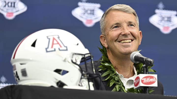 Jul 10, 2024; Las Vegas, NV, USA; Arizona Wildcats head coach Brent Brennan speaks to the media during the Big 12 Media Days at Allegiant Stadium Jul 10, 2024; Las Vegas, NV, USA; Arizona Wildcats head coach Brent Brennan speaks to the media during the Big 12 Media Days at Allegiant Stadium