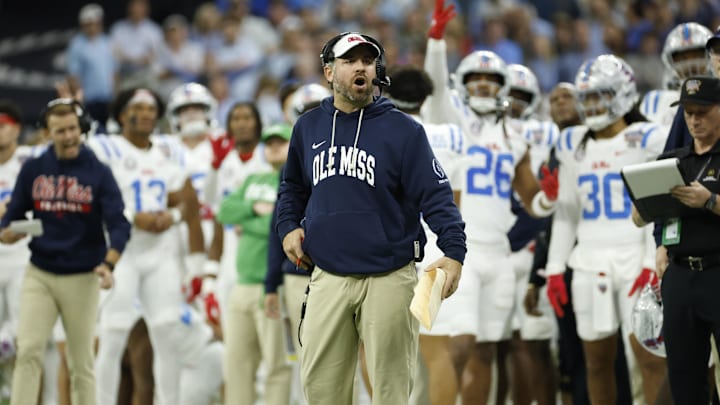 Jan 1, 2026; New Orleans, LA, USA; Mississippi Rebels head coach Pete Golding (center) reacts on the sidelines during the second half of the 2026 Sugar Bowl and quarterfinal game of the College Football Playoff against the Georgia Bulldogs at Caesars Superdome. Mandatory Credit: Amber Searls-Imagn Images