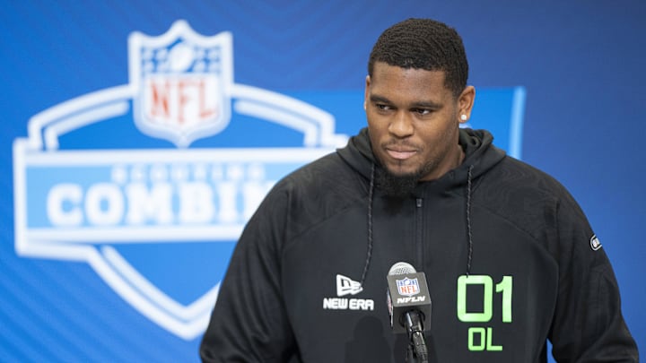 University of Texas offensive lineman Kelvin Banks answers questions at a press conference during the 2025 NFL Combine.