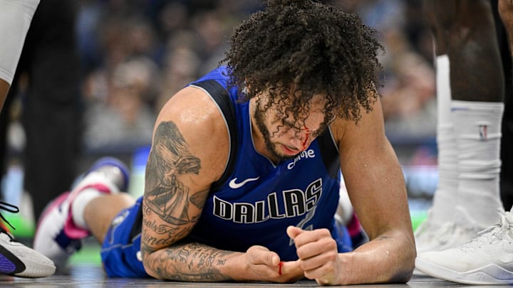 Jan 29, 2024; Dallas, Texas, USA; Dallas Mavericks center Dereck Lively II (2) checks his nose for