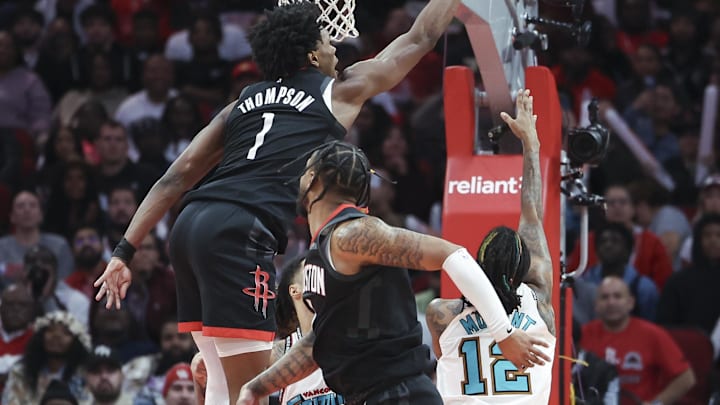Jan 13, 2025; Houston, Texas, USA; Houston Rockets forward Amen Thompson (1) attempts to block a shot by Memphis Grizzlies guard Ja Morant (12) during the second half at Toyota Center. Mandatory Credit: Troy Taormina-Imagn Images Jan 13, 2025; Houston, Texas, USA; Houston Rockets forward Amen Thompson (1) attempts to block a shot by Memphis Grizzlies guard Ja Morant (12) during the second half at Toyota Center. Mandatory Credit: Troy Taormina-Imagn Images