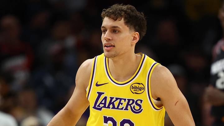 Dec 23, 2025; Phoenix, Arizona, USA; Los Angeles Lakers guard Chris Manon (30) against the Phoenix Suns at Mortgage Matchup Center. Mandatory Credit: Mark J. Rebilas-Imagn Images