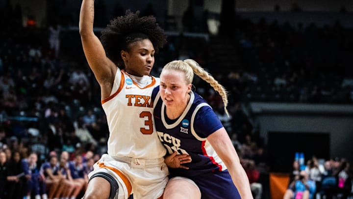 Texas Longhorns guard Rori Harmon (3) defends as TCU Horned Frogs guard Hailey Van Lith (10) drives toward the basket in the first half of the Longhorns' NCAA Playoff Regional final game against the TCU Horned Frogs at Legacy Arena in Birmingham Alabama, March 31, 2025.