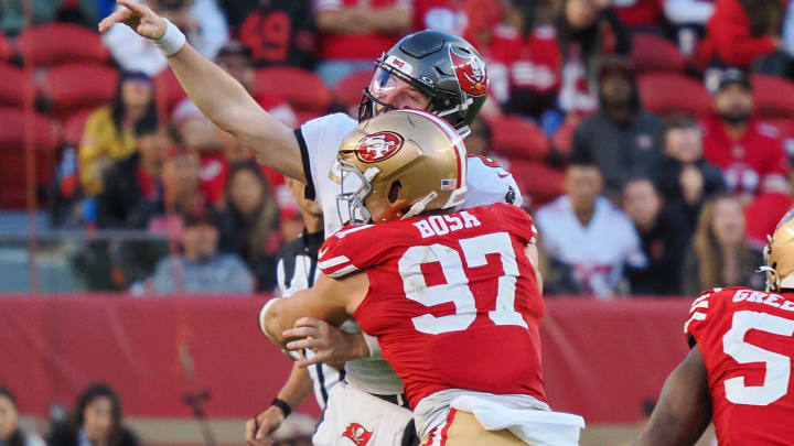 Nov 19, 2023; Santa Clara, California, USA; Tampa Bay Buccaneers quarterback Baker Mayfield (6) throws under pressure from San Francisco 49ers defensive lineman Nick Bosa (97) during the fourth quarter at Levi's Stadium. Mandatory Credit: Kelley L Cox-USA TODAY Sports Nov 19, 2023; Santa Clara, California, USA; Tampa Bay Buccaneers quarterback Baker Mayfield (6) throws under pressure from San Francisco 49ers defensive lineman Nick Bosa (97) during the fourth quarter at Levi's Stadium. Mandatory Credit: Kelley L Cox-USA TODAY Sports