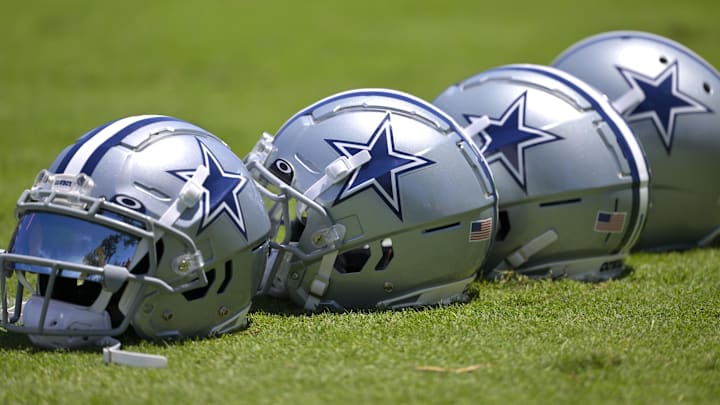 Jul 26, 2023; Oxnard, CA, USA; General view of player helmets on the field during training camp at River Ridge Playing Fields in Oxnard, CA. Mandatory Credit: Jayne Kamin-Oncea-Imagn Images