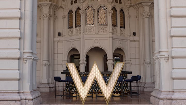 Brand logo seen at the entrance of the Grand W hotel along...