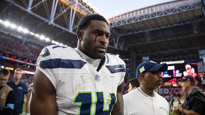 Dec 8, 2024; Glendale, Arizona, USA; Seattle Seahawks wide receiver DK Metcalf (14) against the Arizona Cardinals at State Farm Stadium. Mandatory Credit: Mark J. Rebilas-Imagn Images