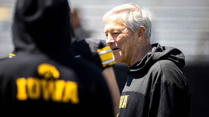 Apr 26, 2025; Iowa City, IA, USA; Iowa head coach Kirk Ferentz talks with players after a spring NCAA football open practice at Kinnick Stadium. Mandatory Credit: Joseph Cress-The Des Moines Register Apr 26, 2025; Iowa City, IA, USA; Iowa head coach Kirk Ferentz talks with players after a spring NCAA football open practice at Kinnick Stadium. Mandatory Credit: Joseph Cress-The Des Moines Register