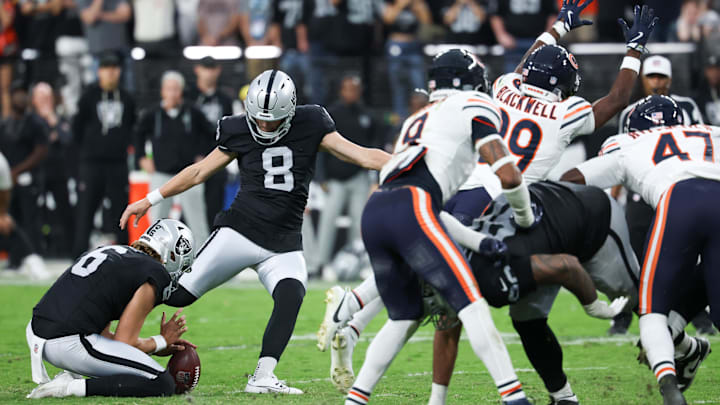 The Bears' Josh Blackwell dives and blocks a potential game-winning field goal by the Raiders Sunday in Las Vegas. 
