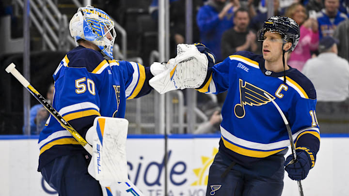 Nov 3, 2025; St. Louis, Missouri, USA; St. Louis Blues center Brayden Schenn (10) celebrates with goaltender Jordan Binnington (50) after the Blues defeated the Edmonton Oilers at Enterprise Center. Mandatory Credit: Jeff Curry-Imagn Images