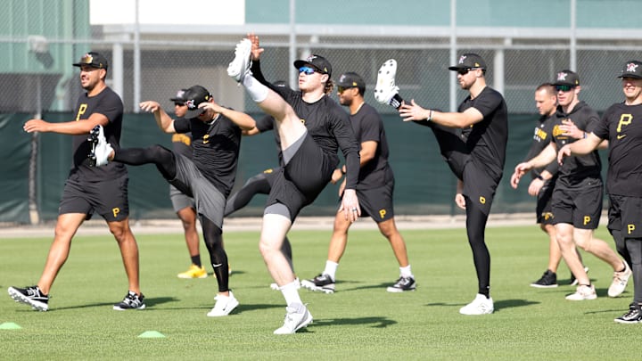 Feb 12, 2025; Bradenton, FL, USA;  Pittsburgh Pirates stretch during spring training workouts at Pirate City. Mandatory Credit: Kim Klement Neitzel-Imagn Images