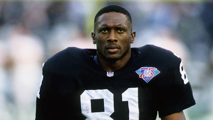 Dec 24, 1994; Los Angeles, CA, USA: FILE PHOTO; Los Angeles Raiders receiver Tim Brown (81) against the Kansas City Chiefs at the Coliseum. Mandatory Credit: Imagn Images Dec 24, 1994; Los Angeles, CA, USA: FILE PHOTO; Los Angeles Raiders receiver Tim Brown (81) against the Kansas City Chiefs at the Coliseum. Mandatory Credit: Imagn Images
