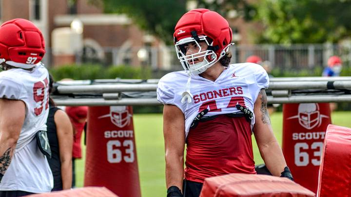 Oklahoma defensive end Taylor Wein looks on during a drill at practice. Oklahoma defensive end Taylor Wein looks on during a drill at practice.