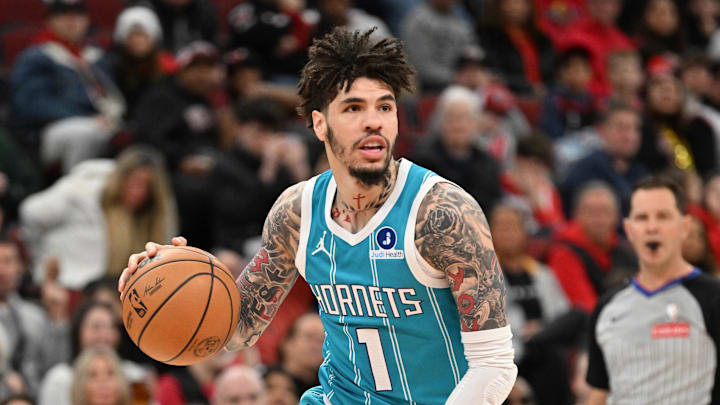 Jan 3, 2026; Chicago, Illinois, USA; Charlotte Hornets guard Lamelo Ball (1) controls the ball against the Chicago Bulls during the first half at United Center. Mandatory Credit: Patrick Gorski-Imagn Images