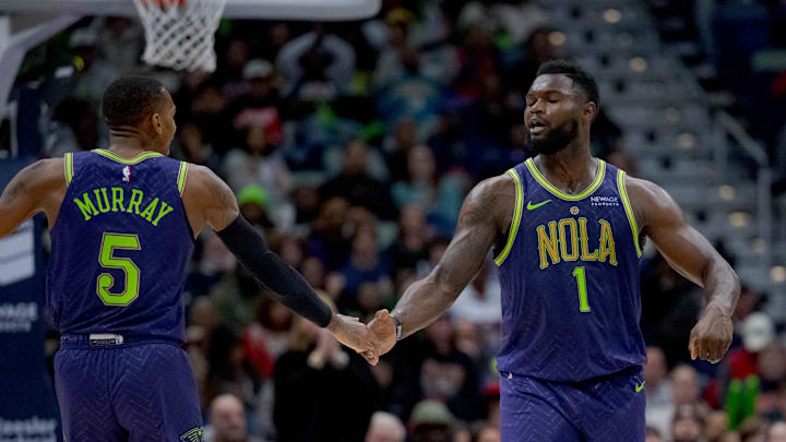 Jan 7, 2025; New Orleans, Louisiana, USA; New Orleans Pelicans guard Dejounte Murray (5) and New Orleans Pelicans forward Zion Williamson (1) celebrate a three-point basket made by Murray with an assist from Williamson during the first half against the Minnesota Timberwolves at Smoothie King Center. Jan 7, 2025; New Orleans, Louisiana, USA; New Orleans Pelicans guard Dejounte Murray (5) and New Orleans Pelicans forward Zion Williamson (1) celebrate a three-point basket made by Murray with an assist from Williamson during the first half against the Minnesota Timberwolves at Smoothie King Center.