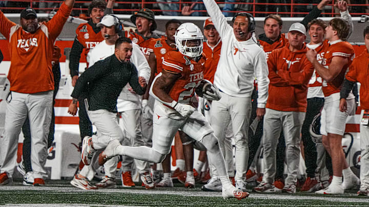 Texas running back Jaydon Blue runs with the ball against Clemson in the first round of the College Football Playoff.