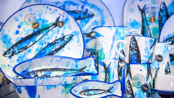 Craft plates and vases featuring images of sardines for sale...