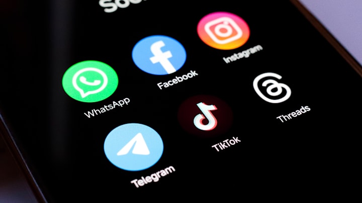 In this photo illustration, WhatsApp, Facebook, Instagram,...