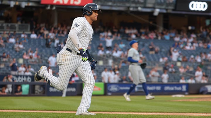 Aug 4, 2024; Bronx, New York, USA; New York Yankees right fielder Juan Soto (22) double during the eighth inning against the Toronto Blue Jays at Yankee Stadium. Mandatory Credit: Vincent Carchietta-Imagn Images