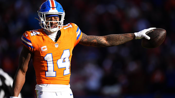 Jan 5, 2025; Denver, Colorado, USA; Denver Broncos wide receiver Courtland Sutton (14) following a first down reception in the first quarter against the Kansas City Chiefs at Empower Field at Mile High. Mandatory Credit: Ron Chenoy-Imagn Images Jan 5, 2025; Denver, Colorado, USA; Denver Broncos wide receiver Courtland Sutton (14) following a first down reception in the first quarter against the Kansas City Chiefs at Empower Field at Mile High. Mandatory Credit: Ron Chenoy-Imagn Images