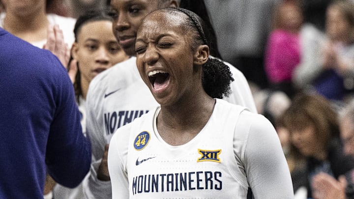 Mar 7, 2025; Kansas City, MO, USA; West Virginia Mountaineers guard Jordan Harrison (10) celebrates after defeating the Kansas State Wildcats at T-Mobile Center. Mandatory Credit: Amy Kontras-Imagn Images