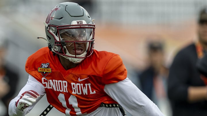 Jan 30, 2025; Mobile, AL, USA; National team wide receiver Kyle Williams of Washington State (11) works through drills during Senior Bowl practice for the National team at Hancock Whitney Stadium. Mandatory Credit: Vasha Hunt-Imagn Images