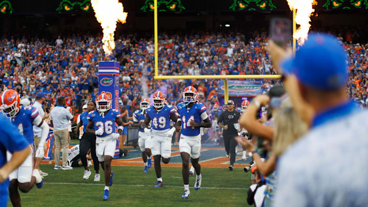 Aug 30, 2025; Gainesville, Florida, USA; Florida Gators defensive back Vincent Brown Jr. (36), Florida Gators edge Jalen Wiggins (49) and Florida Gators defensive back Jordan Castell (14) run onto the field before a game against the Long Island Sharks at Ben Hill Griffin Stadium. Mandatory Credit: Matt Pendleton-Imagn Images Aug 30, 2025; Gainesville, Florida, USA; Florida Gators defensive back Vincent Brown Jr. (36), Florida Gators edge Jalen Wiggins (49) and Florida Gators defensive back Jordan Castell (14) run onto the field before a game against the Long Island Sharks at Ben Hill Griffin Stadium. Mandatory Credit: Matt Pendleton-Imagn Images