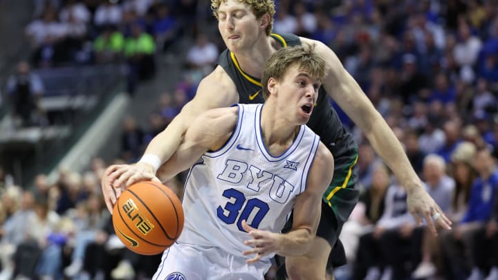 Feb 20, 2024; Provo, Utah, USA; Baylor Bears forward Caleb Lohner (rear) knocks the ball away from Brigham Young Cougars guard Dallin Hall (30) during the second half at Marriott Center. Mandatory Credit: Rob Gray-USA TODAY Sports