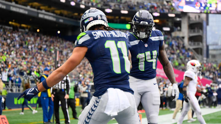 Nov 24, 2024; Seattle, Washington, USA; Seattle Seahawks wide receiver Jaxon Smith-Njigba (11) and wide receiver DK Metcalf (14) celebrate after Jaxon Smith-Njigba scored a touchdown against the Arizona Cardinals during the first half at Lumen Field. Nov 24, 2024; Seattle, Washington, USA; Seattle Seahawks wide receiver Jaxon Smith-Njigba (11) and wide receiver DK Metcalf (14) celebrate after Jaxon Smith-Njigba scored a touchdown against the Arizona Cardinals during the first half at Lumen Field.
