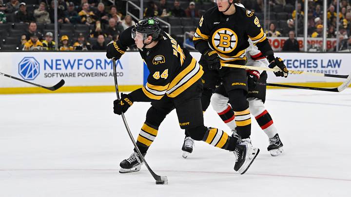 Oct 5, 2026; Boston, Massachusetts, USA; Boston Bruins center James Hagens (44) shoots the puck against goaltender Samuel Ersson (not pictured) during the third period at TD Garden. Mandatory Credit: Eric Canha-Imagn Images
