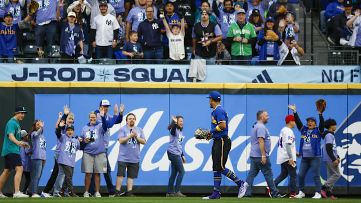 Seattle Mariners center fielder Julio Rodriguez waves towards fans before a game against the New York Yankees on Sept. 17 at T-Mobile Park.