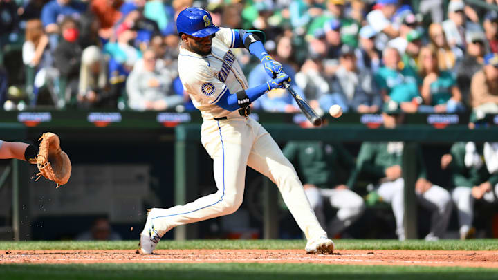 Seattle Mariners right fielder Victor Robles hits an RBI double during a game against the Oakland Athletics on Sept. 29 at T-Mobile Park. Seattle Mariners right fielder Victor Robles hits an RBI double during a game against the Oakland Athletics on Sept. 29 at T-Mobile Park.