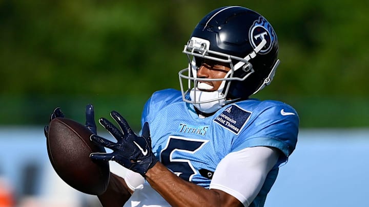 Tennessee Titans wide receiver Elic Ayomanor (5) makes a catch during an NFL football training camp practice at Ascension Saint Thomas Sports Park Saturday, Aug. 2, 2025, in Nashville, Tenn.