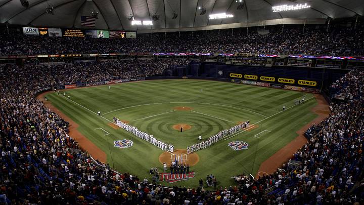 Oct 11, 2009; Minnesota, MN, USA; New York Yankees and Minnesota Twins line up on the baselines during the national anthem prior to game 3 of the 2009 ALDS at the Metrodome.  Mandatory Credit: Jeff Hanisch-USA TODAY Sports