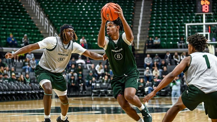 Michigan State's A.J. Hoggard, right, moves to the basket as Coen Carr defends during the MSU basketball team scrimmage on Saturday, Oct. 21, 2023, at the Breslin Center in East Lansing.