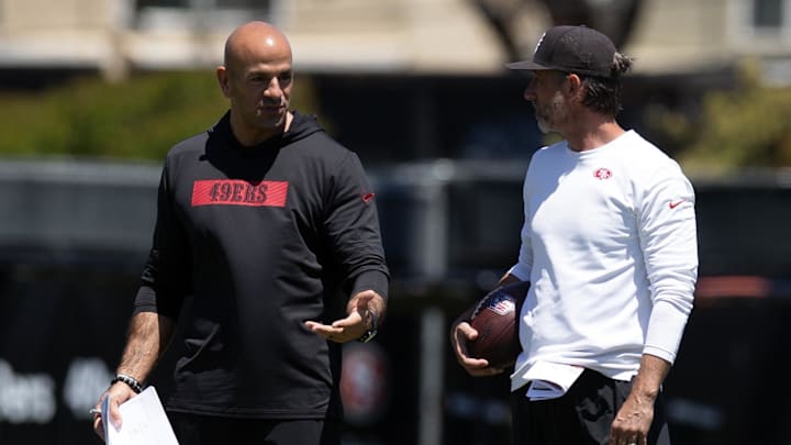 May 9, 2025; Santa Clara, CA, USA; San Francisco 49ers head coach Kyle Shanahan, right, confers with defensive coordinator Robert Saleh during the teamís rookie minicamp. Mandatory Credit: D. Ross Cameron-Imagn Images