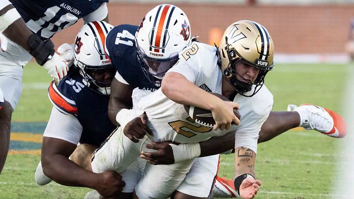 Vanderbilt Commodores quarterback Jared Curtis (2) is tackled by Auburn Tigers edge Jared Smith (41) as Auburn Tigers take on Vanderbilt Commodores at Jordan-Hare Stadium in Auburn, Ala. on Saturday, Sept. 26, 2026. Auburn Tigers defeated Vanderbilt Commodores 21-15. Vanderbilt Commodores quarterback Jared Curtis (2) is tackled by Auburn Tigers edge Jared Smith (41) as Auburn Tigers take on Vanderbilt Commodores at Jordan-Hare Stadium in Auburn, Ala. on Saturday, Sept. 26, 2026. Auburn Tigers defeated Vanderbilt Commodores 21-15.
