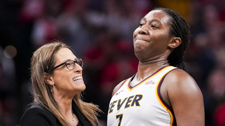 May 24, 2025; Indianapolis, Indiana, USA; Indiana Fever head coach Stephanie White talks with forward Aliyah Boston (7) during a game between the Indiana Fever and the New York Liberty at Gainbridge Fieldhouse. Mandatory Credit: Grace Smith/USA Today Network via Imagn Images