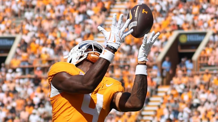 Sep 20, 2025; Knoxville, Tennessee, USA; Tennessee Volunteers wide receiver Mike Matthews (4) catches a pass for a touchdown against the UAB Blazers during the first quarter at Neyland Stadium. Mandatory Credit: Randy Sartin-Imagn Images Sep 20, 2025; Knoxville, Tennessee, USA; Tennessee Volunteers wide receiver Mike Matthews (4) catches a pass for a touchdown against the UAB Blazers during the first quarter at Neyland Stadium. Mandatory Credit: Randy Sartin-Imagn Images