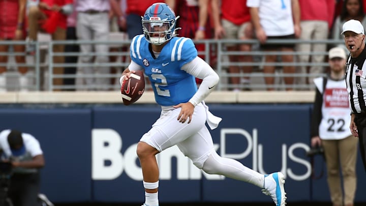 Sep 28, 2024; Oxford, Mississippi, USA; Mississippi Rebels quarterback Jaxson Dart (2) scrambles during the first half against the Kentucky Wildcats at Vaught-Hemingway Stadium. Mandatory Credit: Petre Thomas-Imagn Images