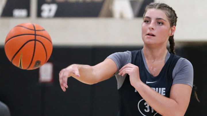 Purdue Boilermakers guard Sophie Swanson (31) passes the ball 